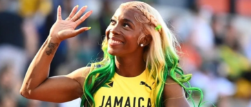 Mommy Rocket waves to the crowd at the 2022 IAAF World Championships