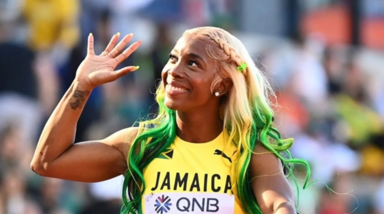 Mommy Rocket waves to the crowd at the 2022 IAAF World Championships