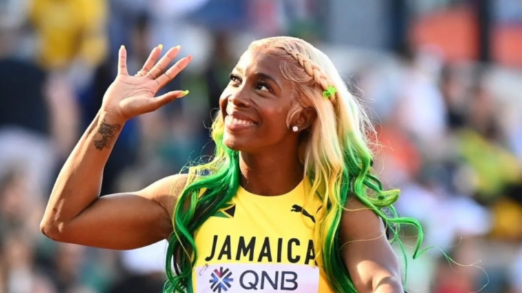 Mommy Rocket waves to the crowd at the 2022 IAAF World Championships