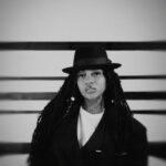 Jada Kingdom rocks a full suit in the music video for her single, "Still Searching."