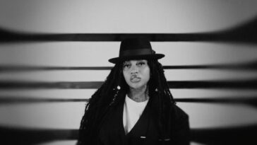 Jada Kingdom rocks a full suit in the music video for her single, "Still Searching."