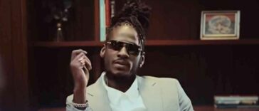 Aidonia looks on keenly during his music video for 'Like How Yuh Feel.'