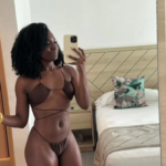 Tahje Bennett showng off her world-class beauty in the mirror.